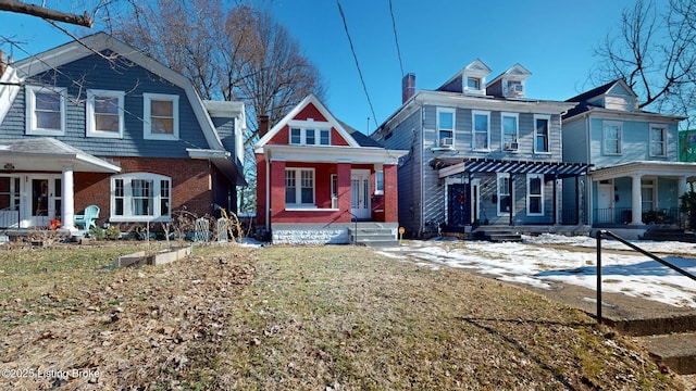 view of front of house with a pergola