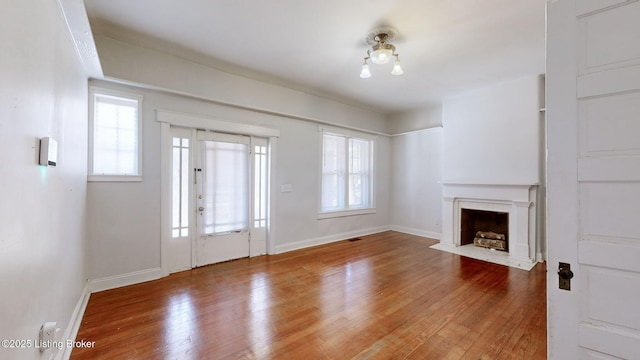 foyer entrance with hardwood / wood-style floors