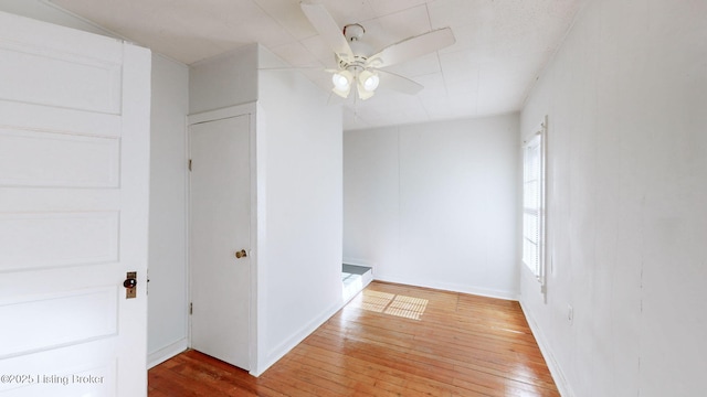 corridor featuring hardwood / wood-style flooring