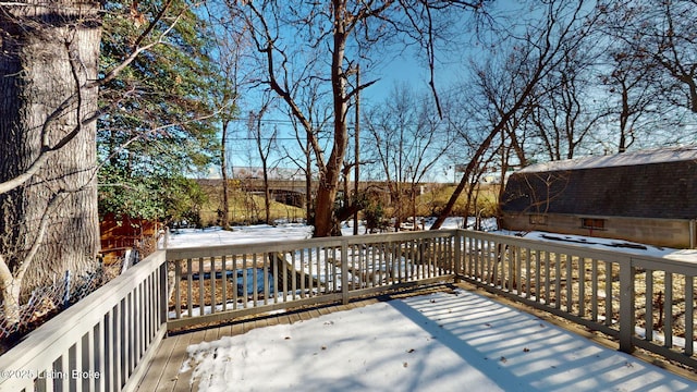 view of snow covered deck