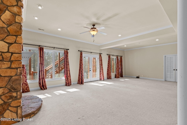 spare room with french doors, light colored carpet, and crown molding