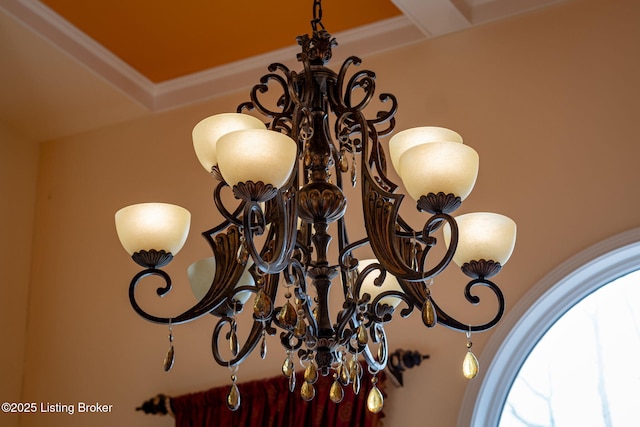 interior details featuring a notable chandelier