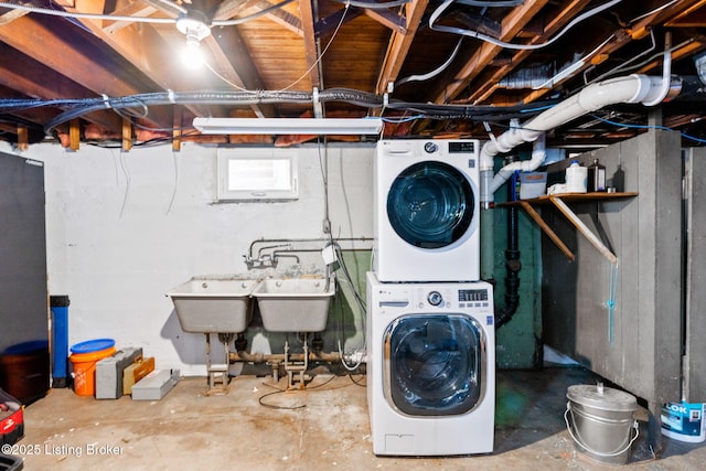 laundry room featuring stacked washer and dryer