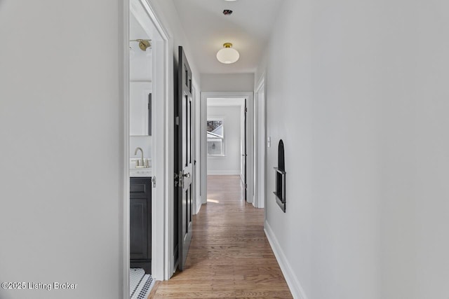 hallway featuring light hardwood / wood-style floors