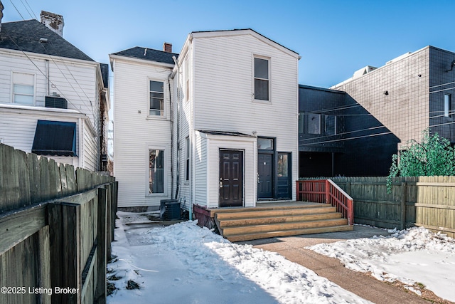 view of snow covered property