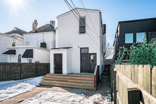 view of front of house with central AC unit