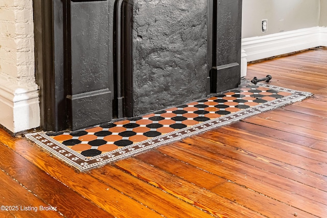 interior details with hardwood / wood-style flooring