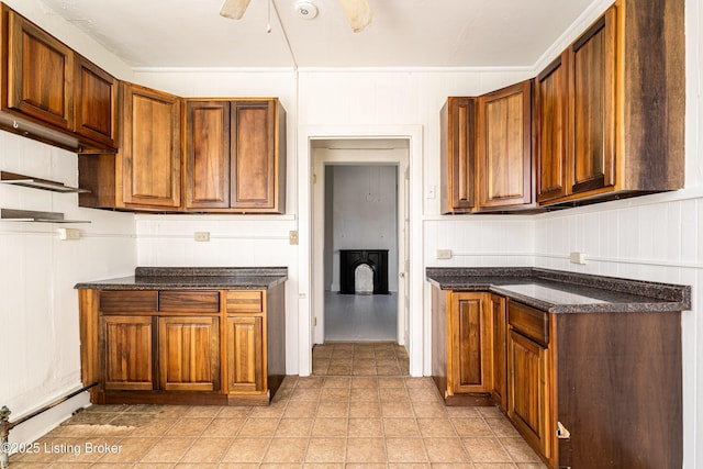 kitchen featuring ceiling fan