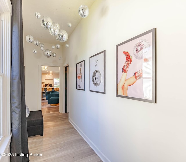 corridor featuring light hardwood / wood-style flooring