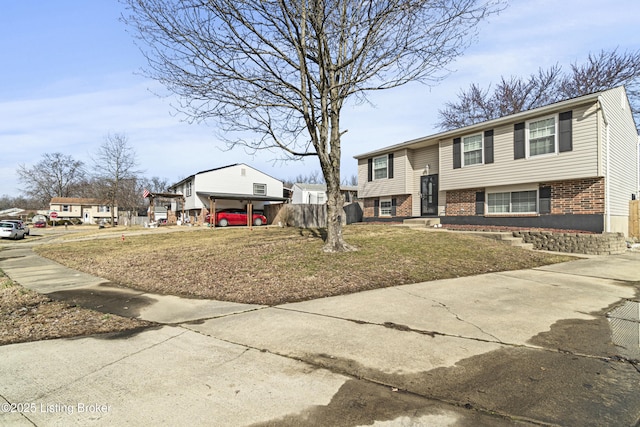 split foyer home with a carport