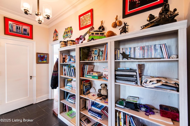 interior space with an inviting chandelier and crown molding