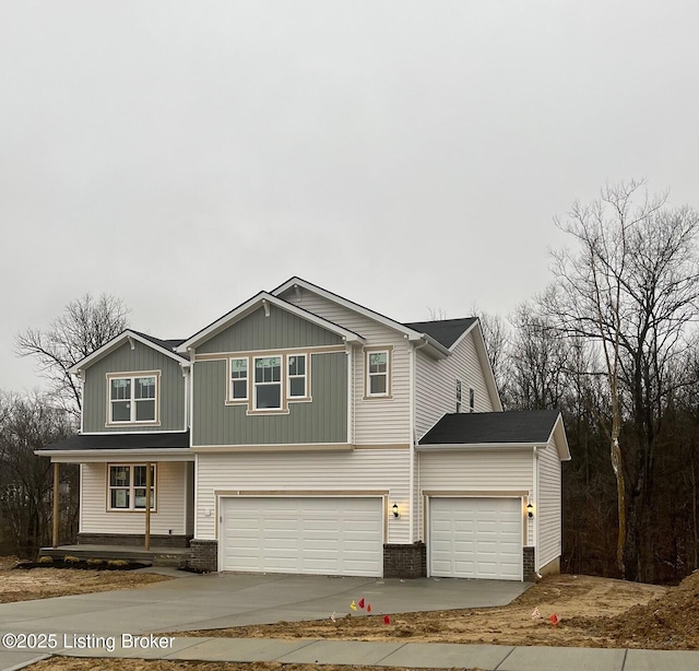 view of front of property featuring a garage