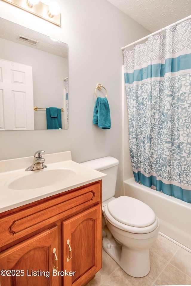 full bathroom featuring toilet, vanity, shower / bathtub combination with curtain, and tile patterned flooring