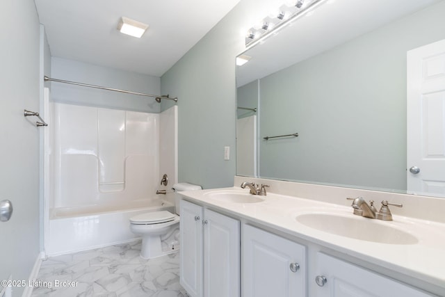 full bathroom with vanity, washtub / shower combination, and toilet