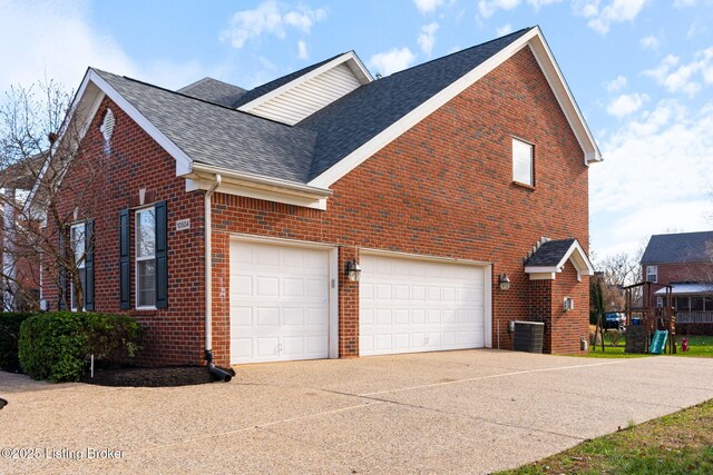 view of property exterior featuring a garage and cooling unit