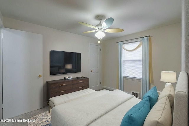 carpeted bedroom featuring ceiling fan