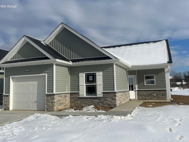 view of front of home with a garage