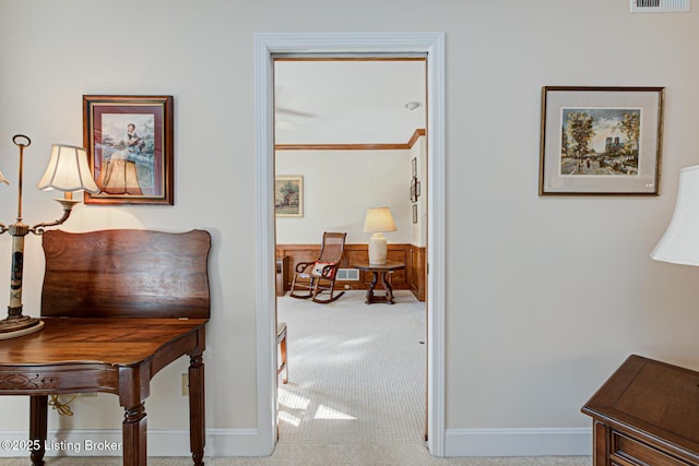 hallway featuring carpet