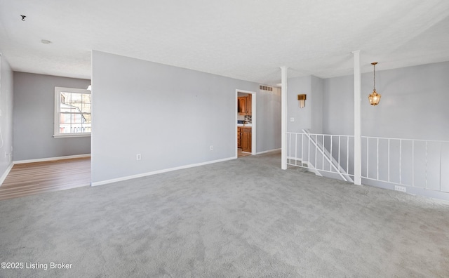 empty room with carpet floors