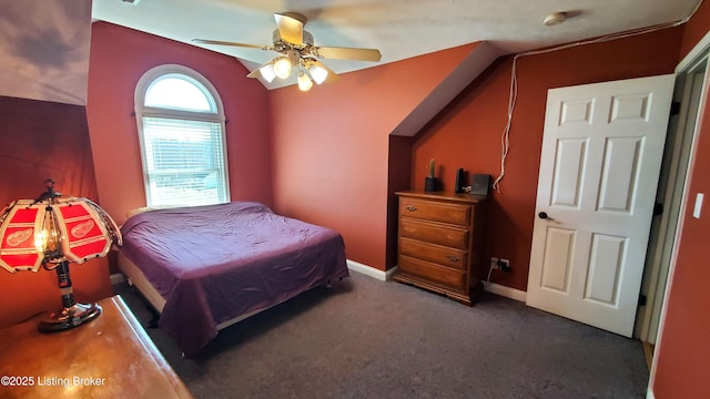 carpeted bedroom with lofted ceiling and ceiling fan