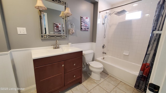 full bathroom with shower / bath combination with curtain, tile patterned floors, toilet, and vanity