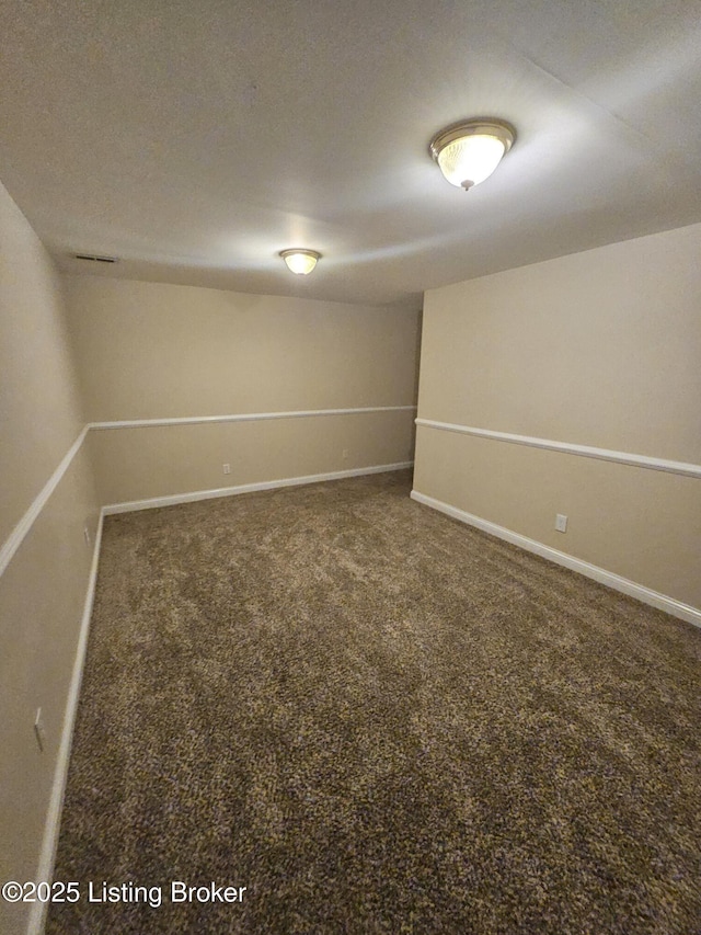 basement featuring carpet flooring