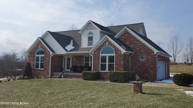 front of property featuring a garage and a front lawn