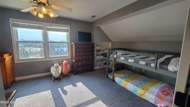 bedroom featuring lofted ceiling, carpet floors, and ceiling fan