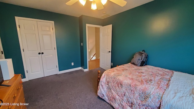 carpeted bedroom with a closet and ceiling fan