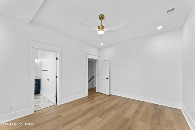 unfurnished bedroom featuring ceiling fan and light hardwood / wood-style flooring