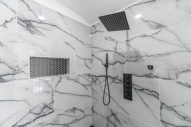 room details with a tile shower