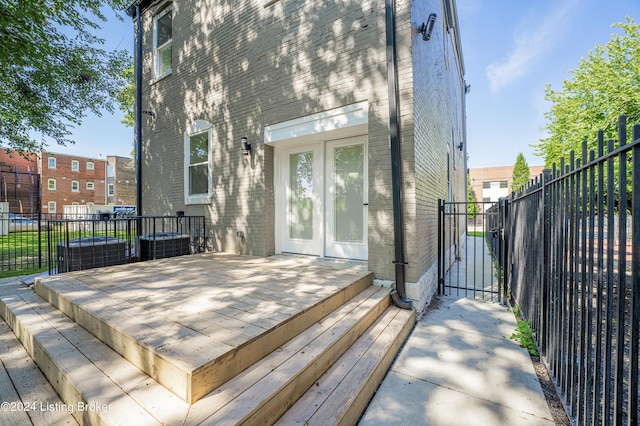 wooden terrace with central AC and french doors