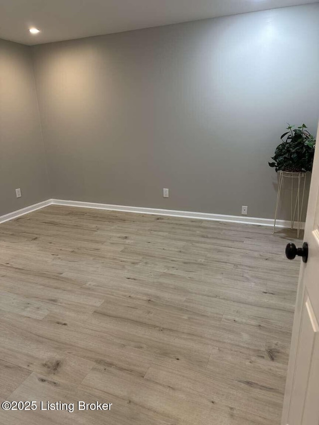 unfurnished room featuring light wood-type flooring