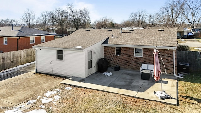 rear view of property with a patio area