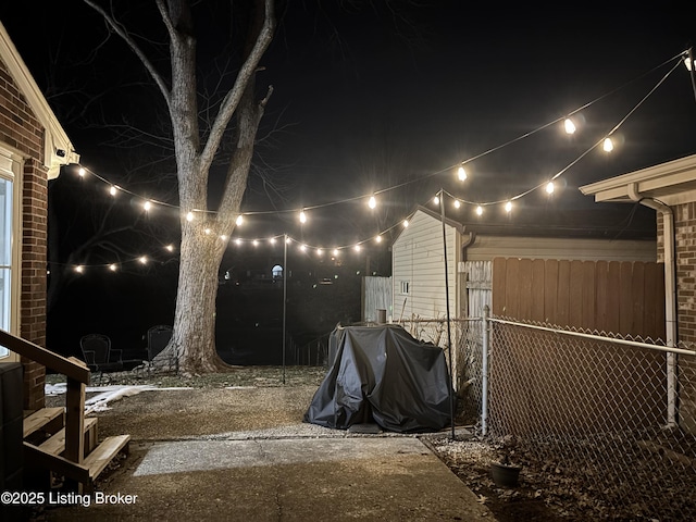 view of yard at twilight