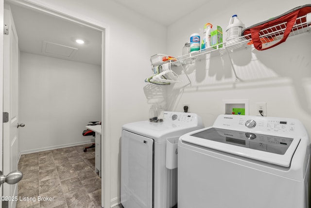 laundry room with independent washer and dryer