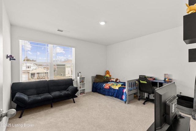 bedroom featuring carpet