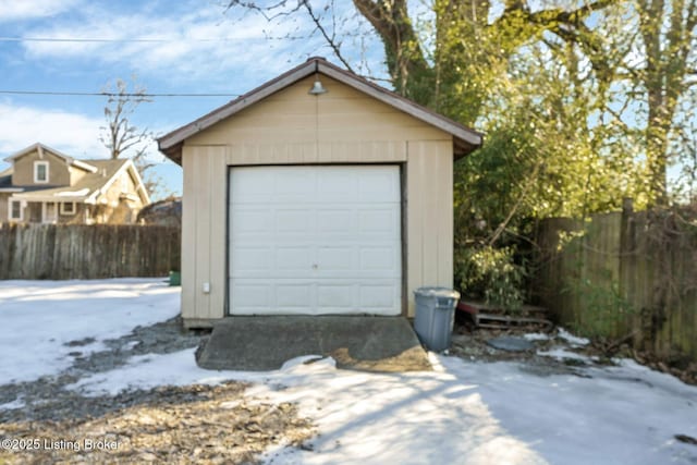 view of snow covered garage