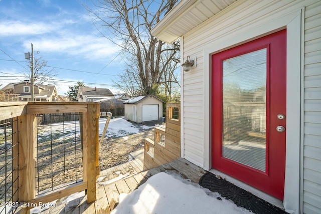 view of snow covered property entrance