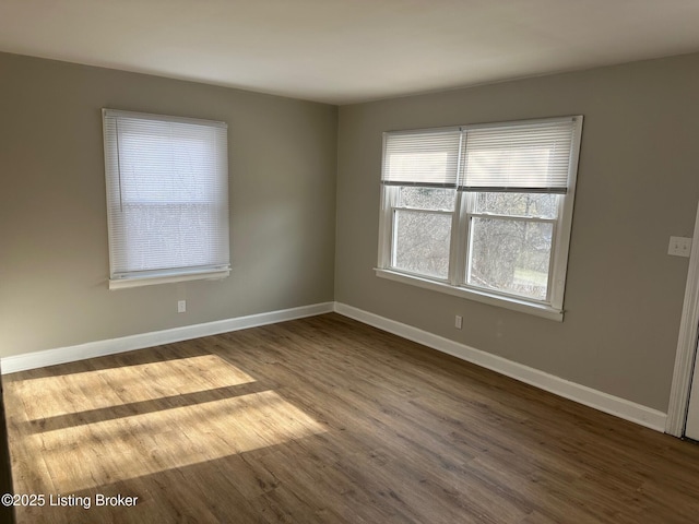 empty room featuring hardwood / wood-style floors