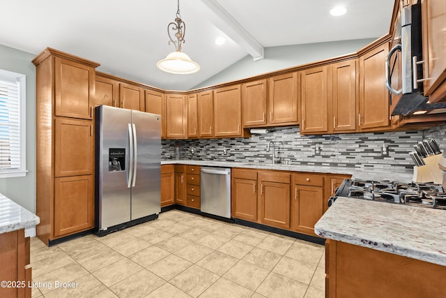 kitchen with sink, appliances with stainless steel finishes, vaulted ceiling with beams, decorative backsplash, and decorative light fixtures