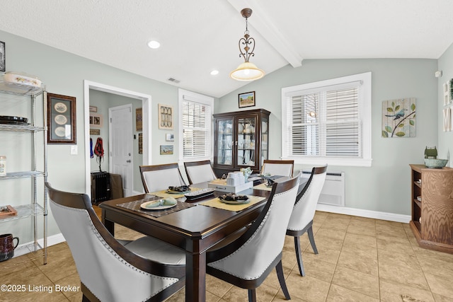 dining space with radiator, light tile patterned floors, a textured ceiling, and vaulted ceiling with beams