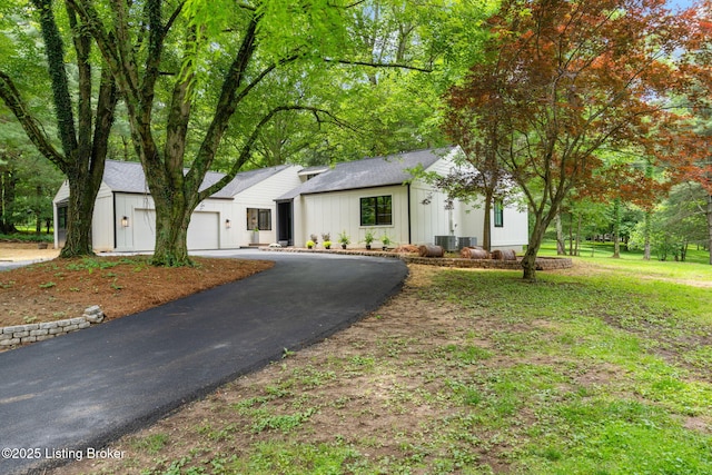 modern farmhouse with a garage