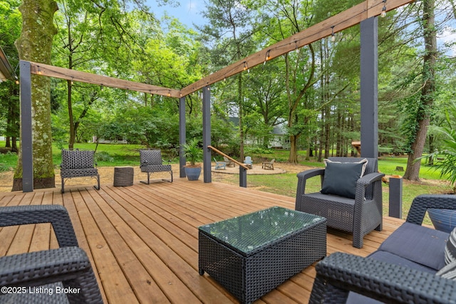 wooden terrace with a yard