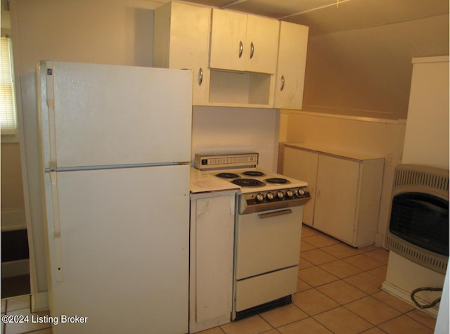 kitchen with white cabinetry, white appliances, heating unit, and light tile patterned floors