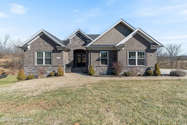 craftsman-style home with a front lawn