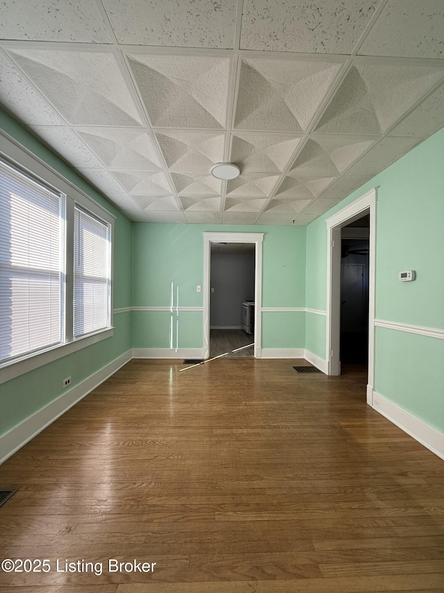 empty room featuring hardwood / wood-style floors