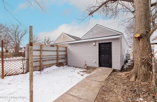 view of snow covered house