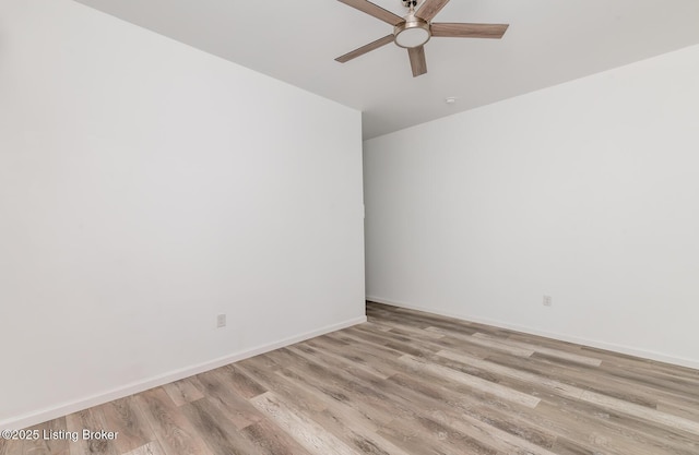 unfurnished room with ceiling fan and light wood-type flooring