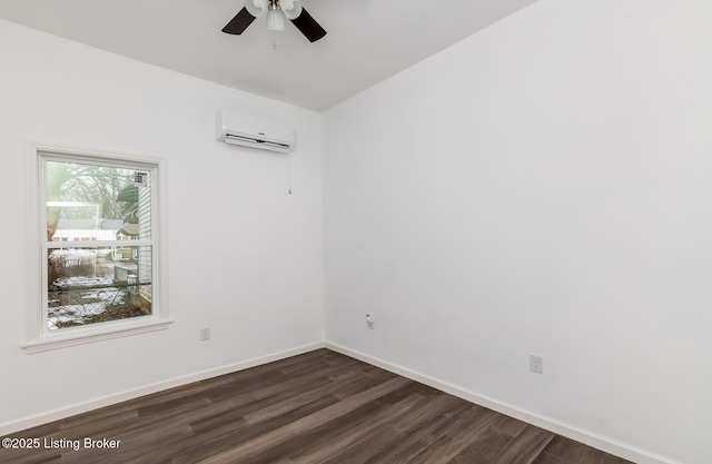 unfurnished room with ceiling fan, dark hardwood / wood-style flooring, and an AC wall unit